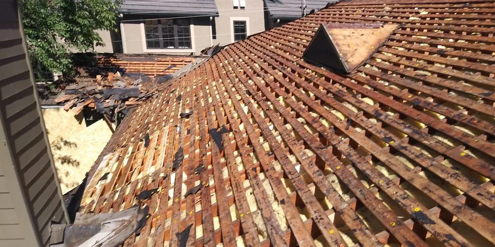 Slide of Noble Roofing