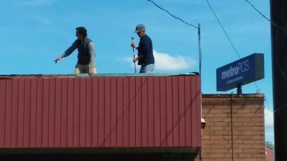 Slide of Noble Roofing