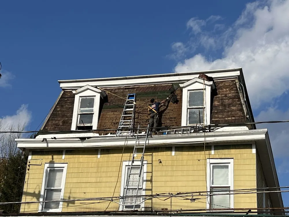 Slide of Noble Roofing