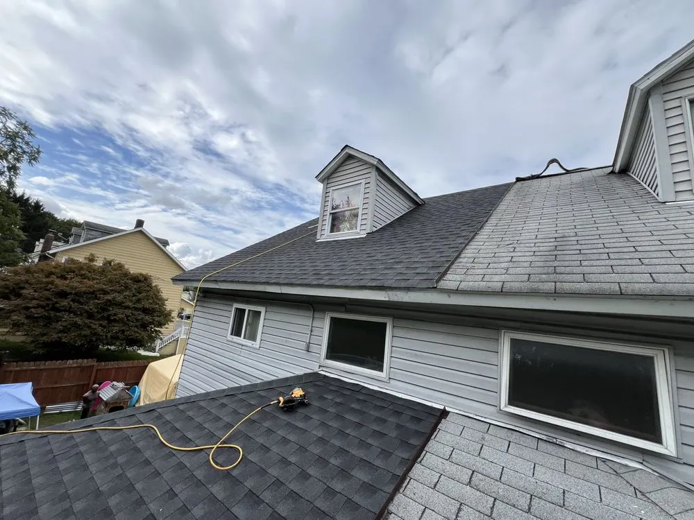 Slide of Noble Roofing