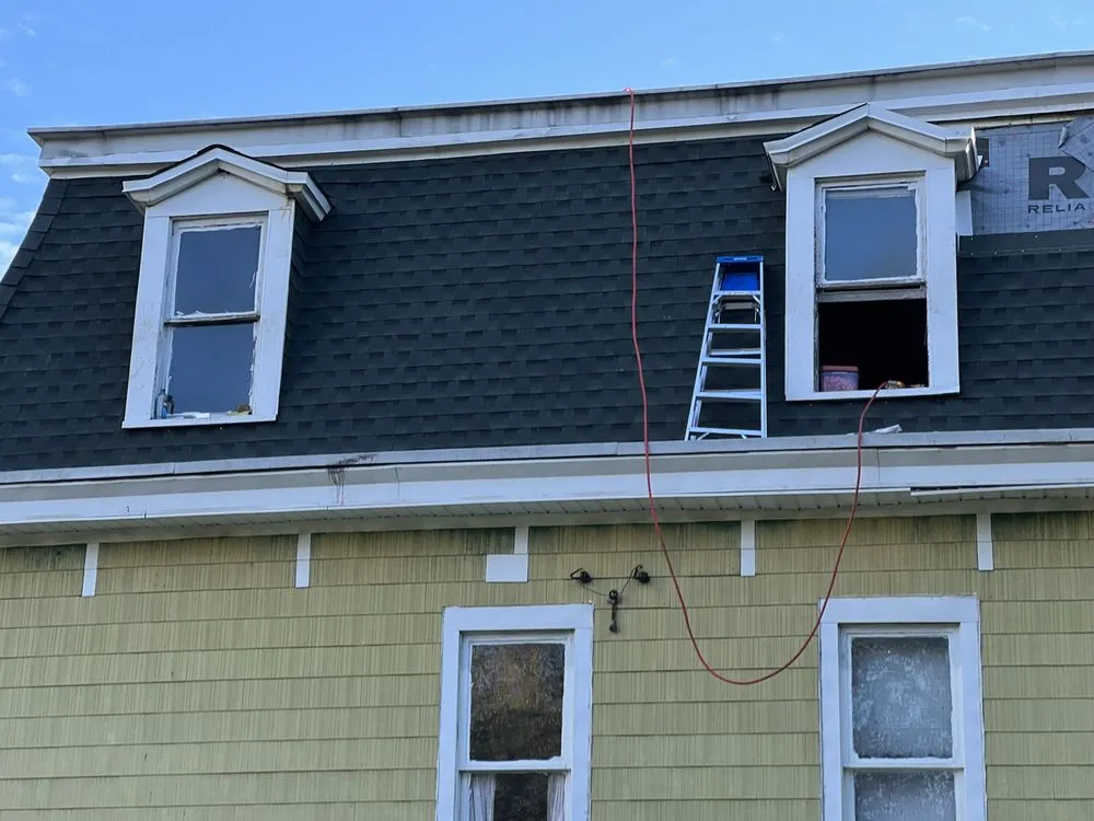 Slide of Noble Roofing