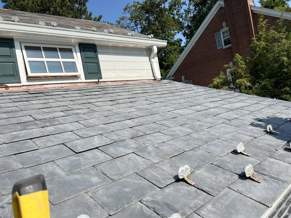 Slide of Noble Roofing