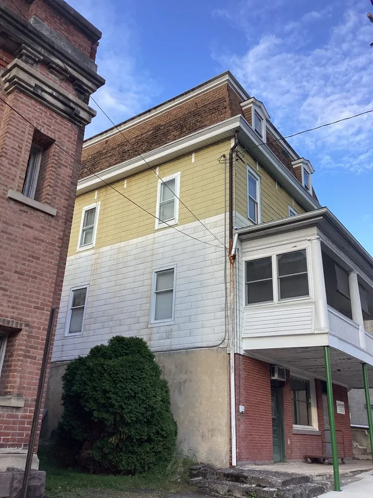 Slide of Noble Roofing