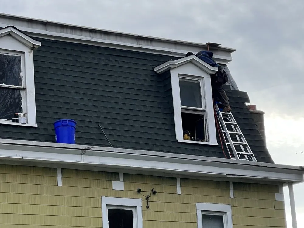 Slide of Noble Roofing