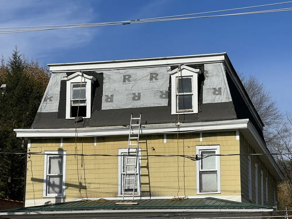 Slide of Noble Roofing