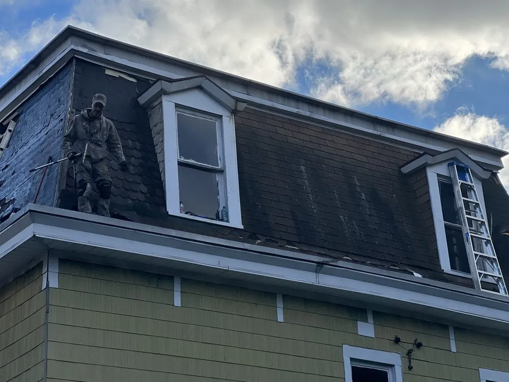 Slide of Noble Roofing