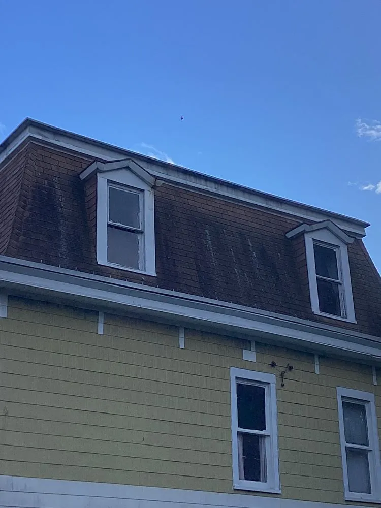 Slide of Noble Roofing