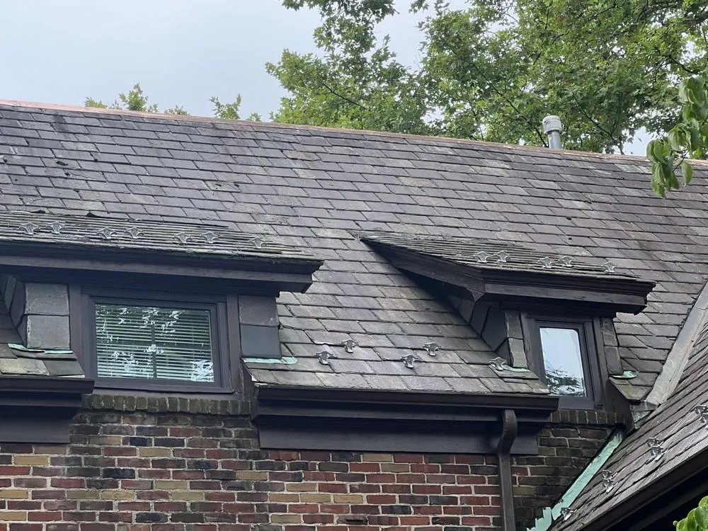 Slide of Noble Roofing