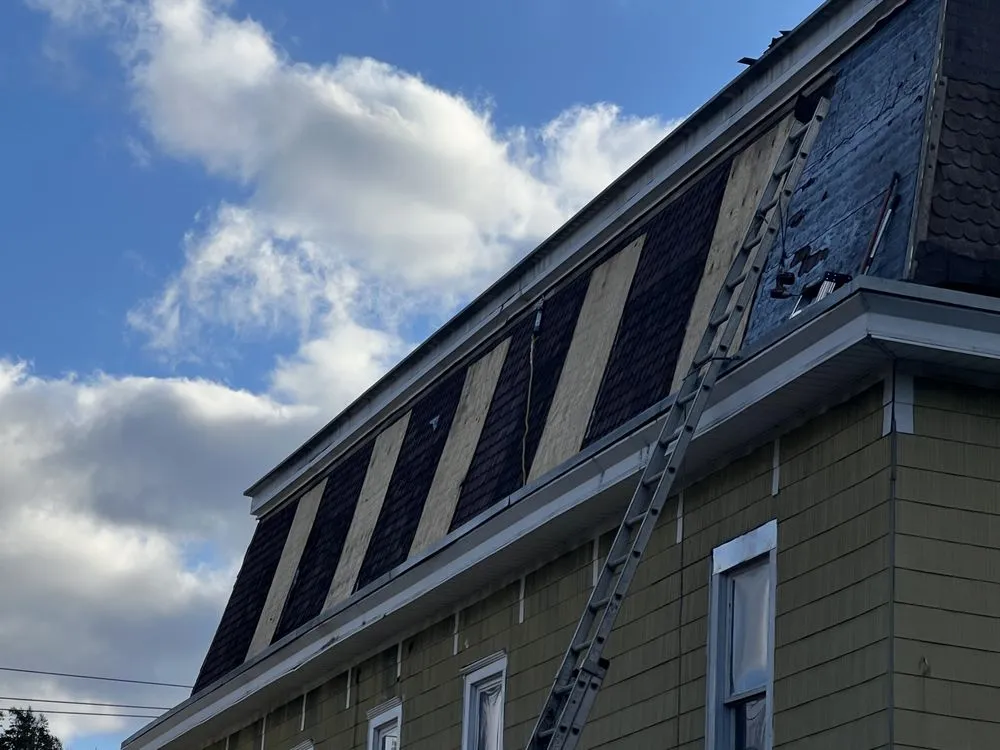 Slide of Noble Roofing