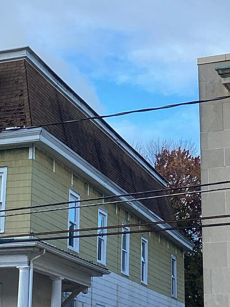 Slide of Noble Roofing