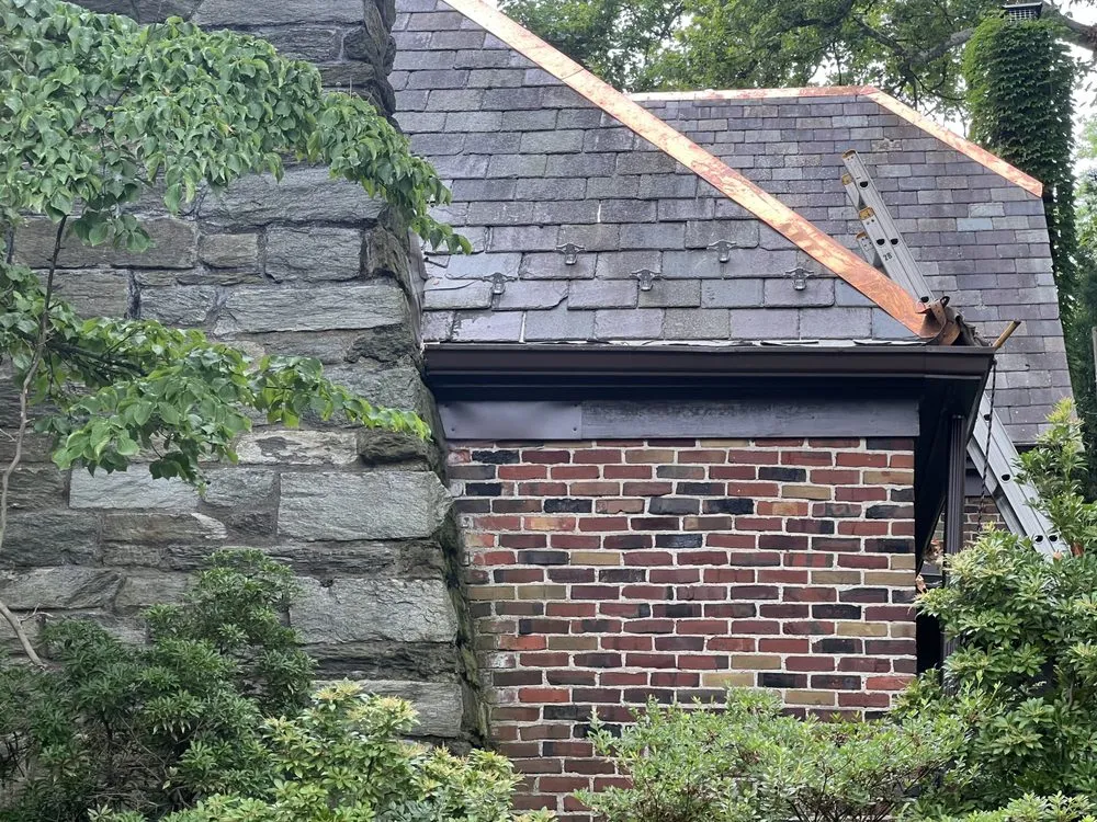 Slide of Noble Roofing