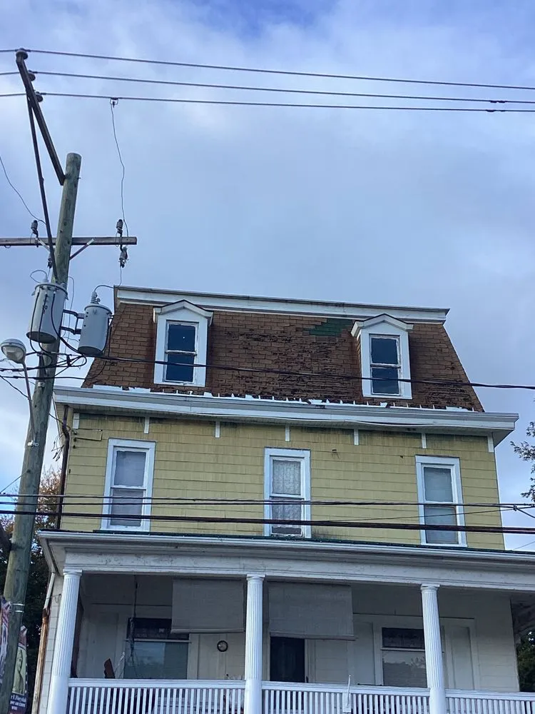 Slide of Noble Roofing