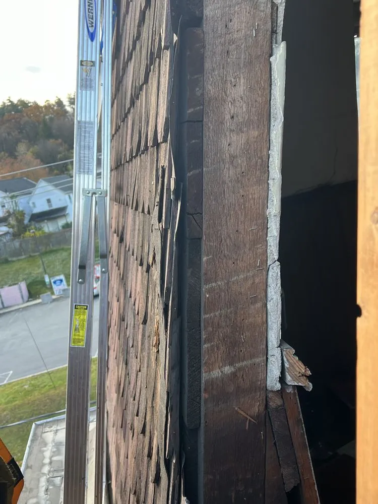 Slide of Noble Roofing