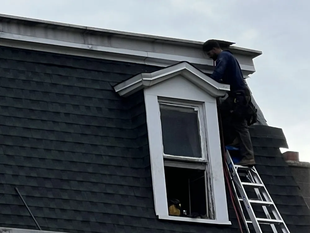 Slide of Noble Roofing