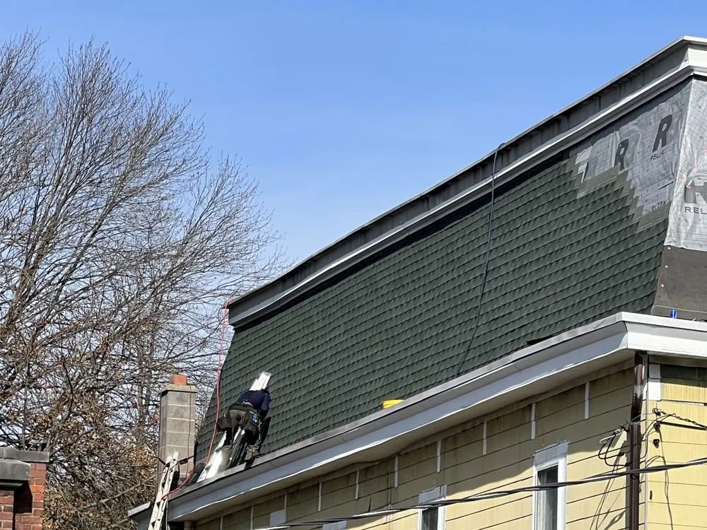 Slide of Noble Roofing