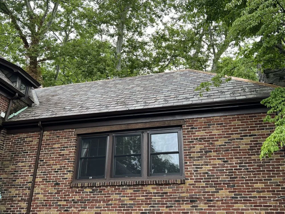 Slide of Noble Roofing