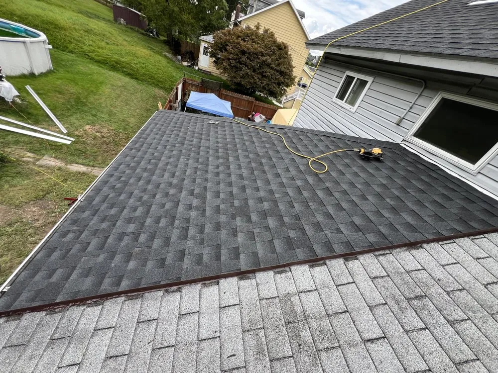 Slide of Noble Roofing