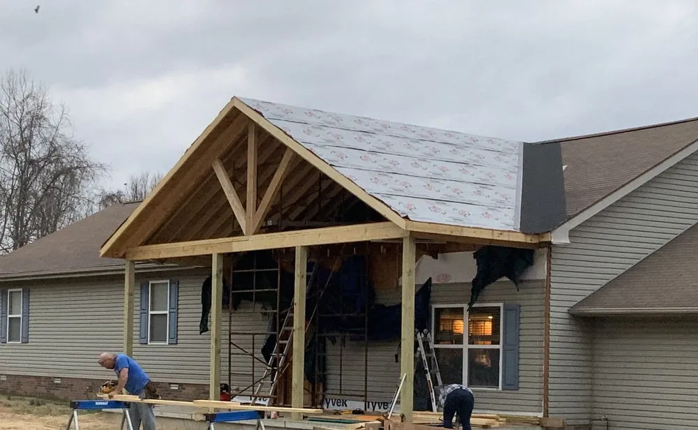 Slide of Noble Roofing