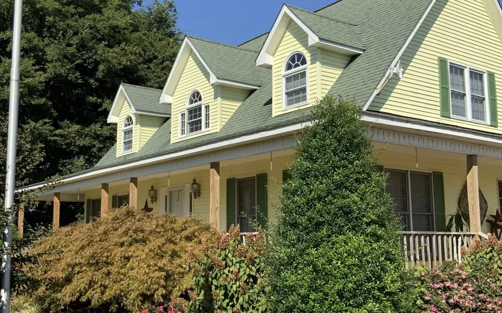 Slide of Noble Roofing