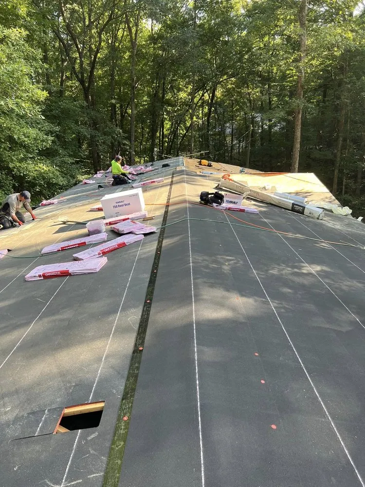 Slide of Noble Roofing