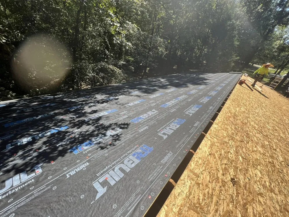 Slide of Noble Roofing