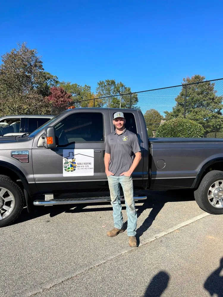 Slide of Noble Roofing
