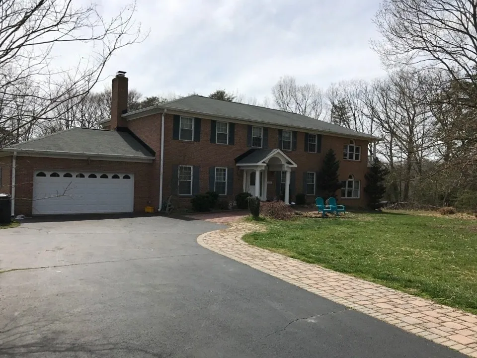 Slide of Noble Roofing