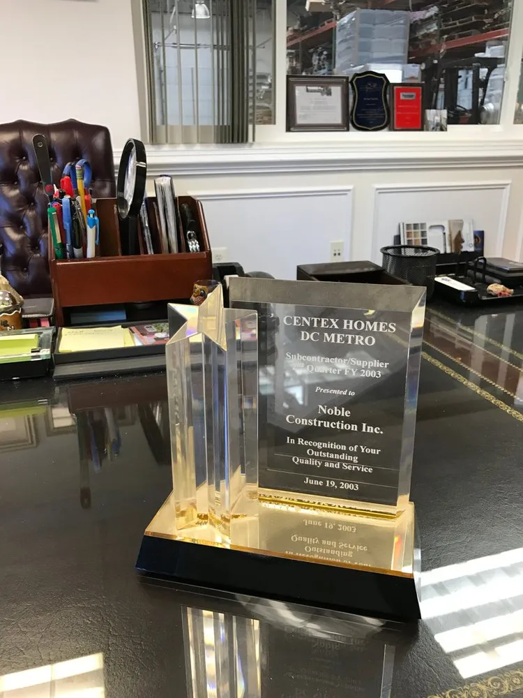 Slide of Noble Roofing