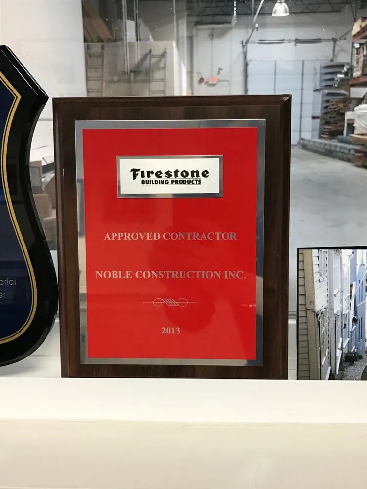 Slide of Noble Roofing