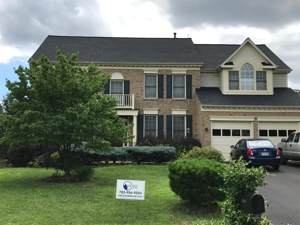 Slide of Noble Roofing