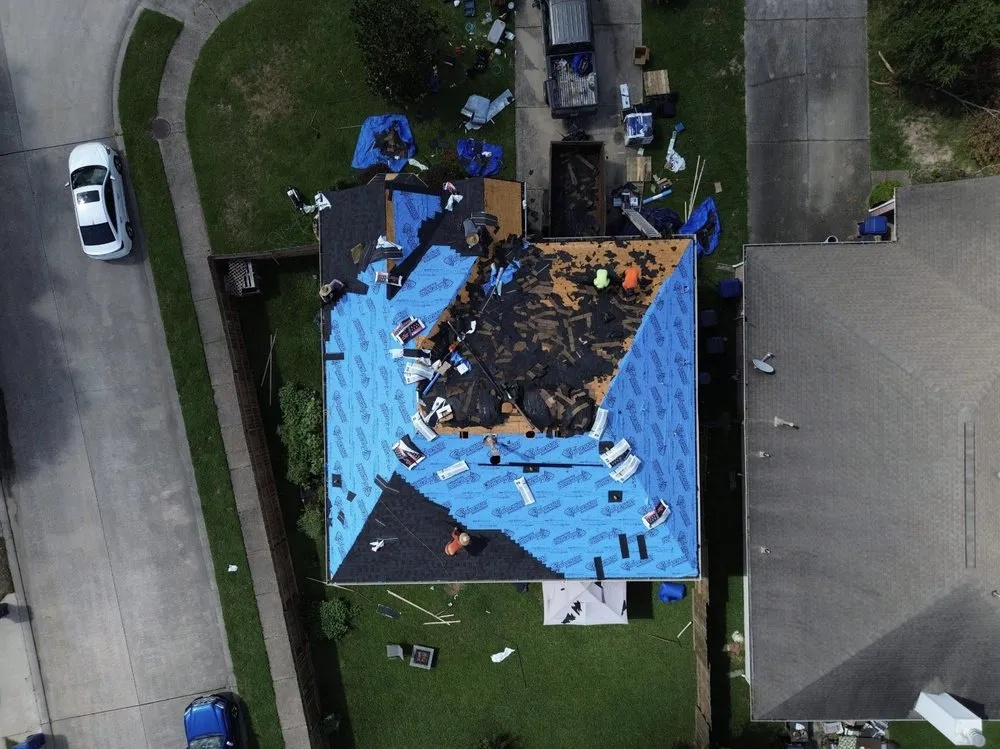 Slide of Noble Roofing