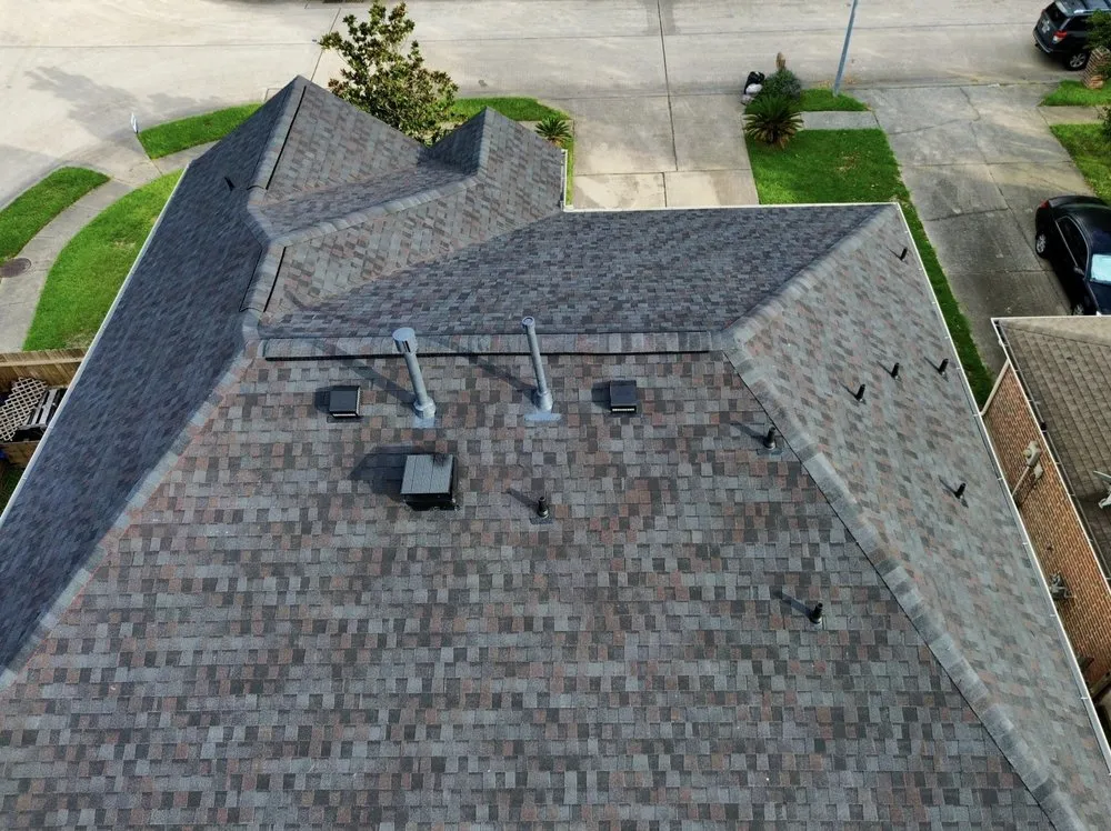 Slide of Noble Roofing