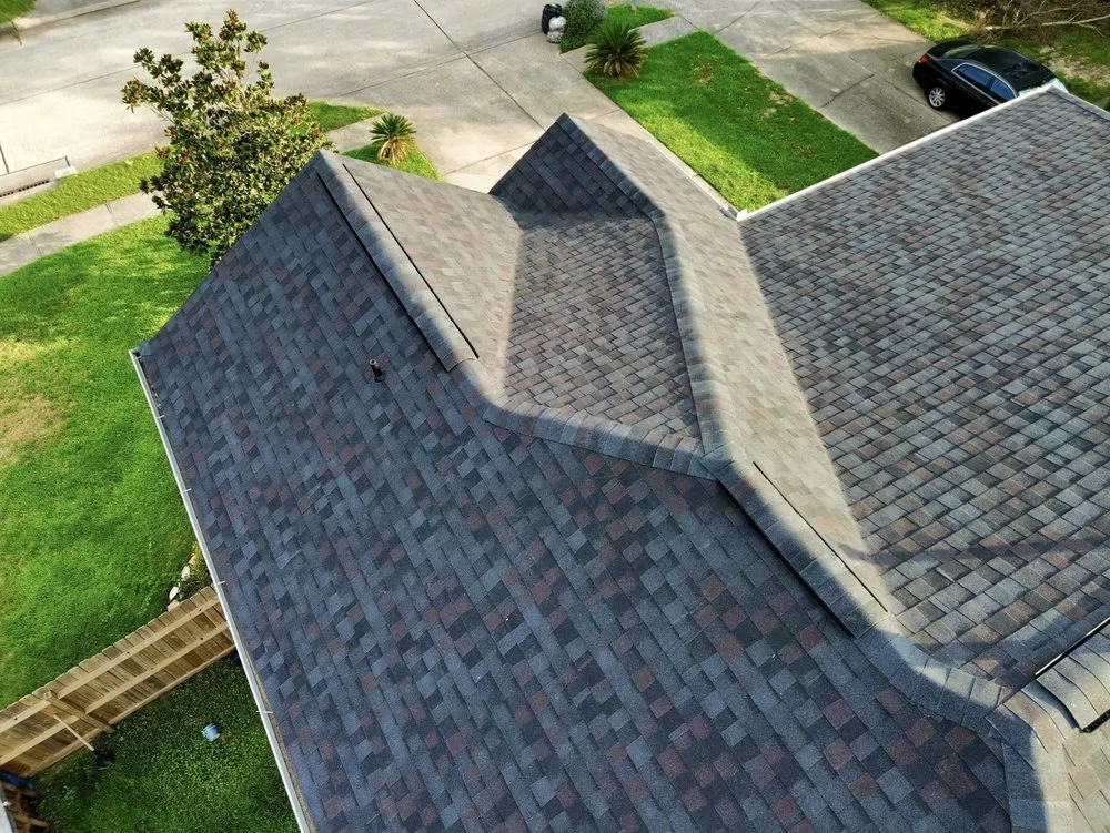 Slide of Noble Roofing