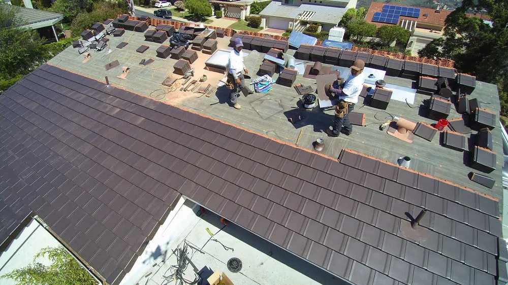 Slide of Nolanco Roofing