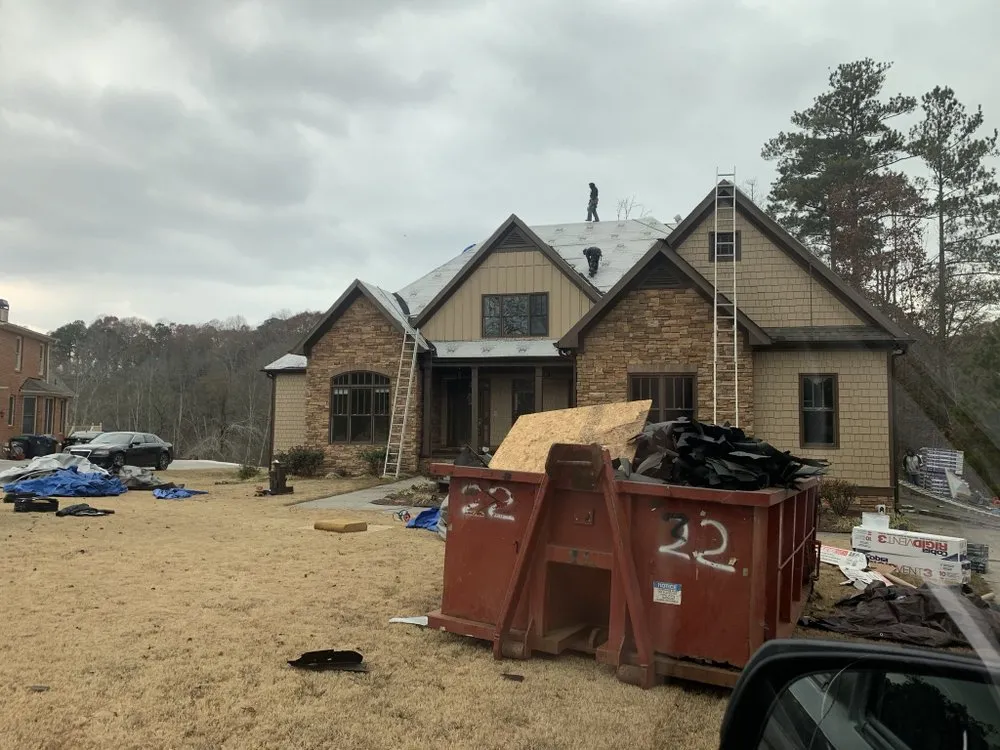 Slide of Noland Roofing