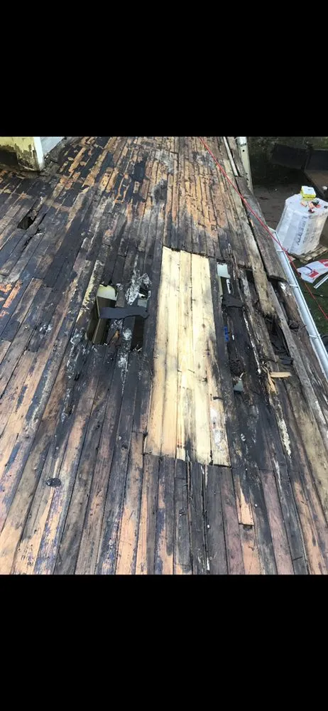 Slide of Noland Roofing