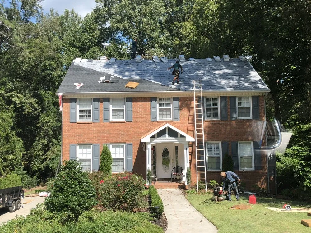 Slide of Noland Roofing