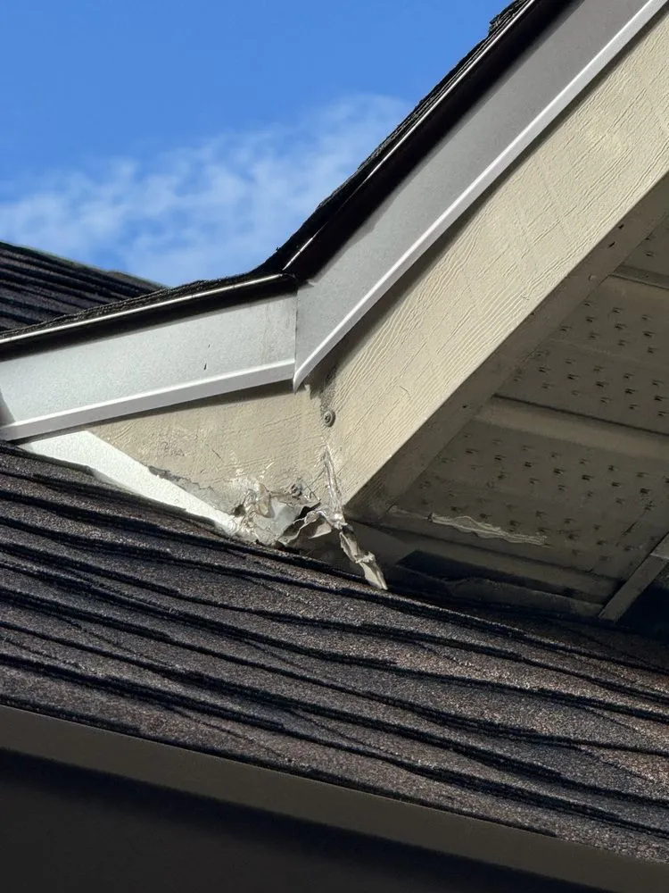 Slide of Noland's Roofing