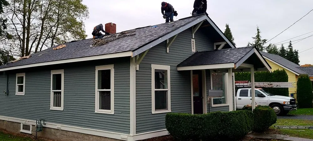 Slide of Nolans Roofing