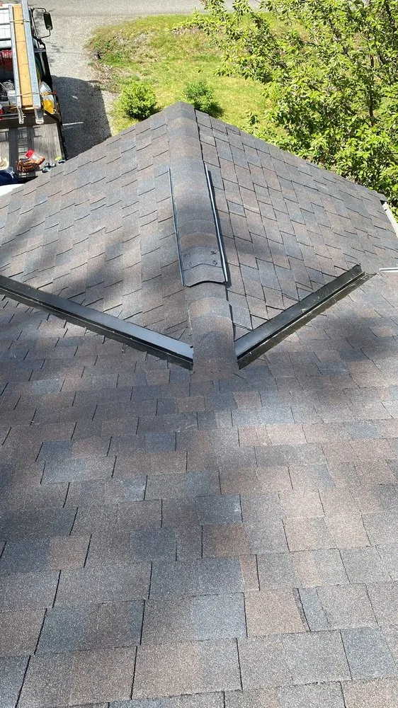 Slide of Nolans Roofing