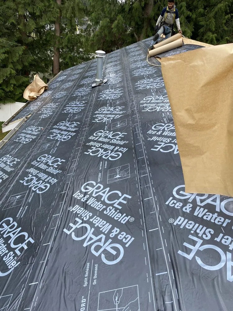 Slide of Nolans Roofing