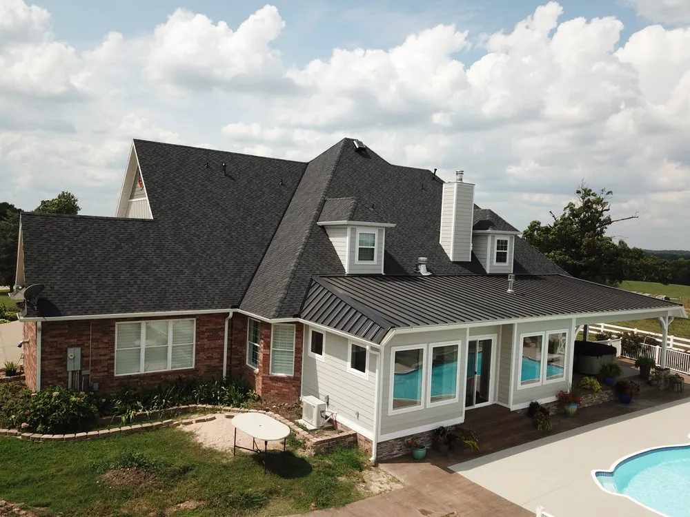 Slide of Nomads Roofing