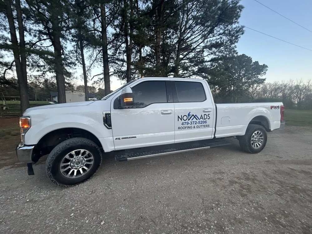 Slide of Nomads Roofing