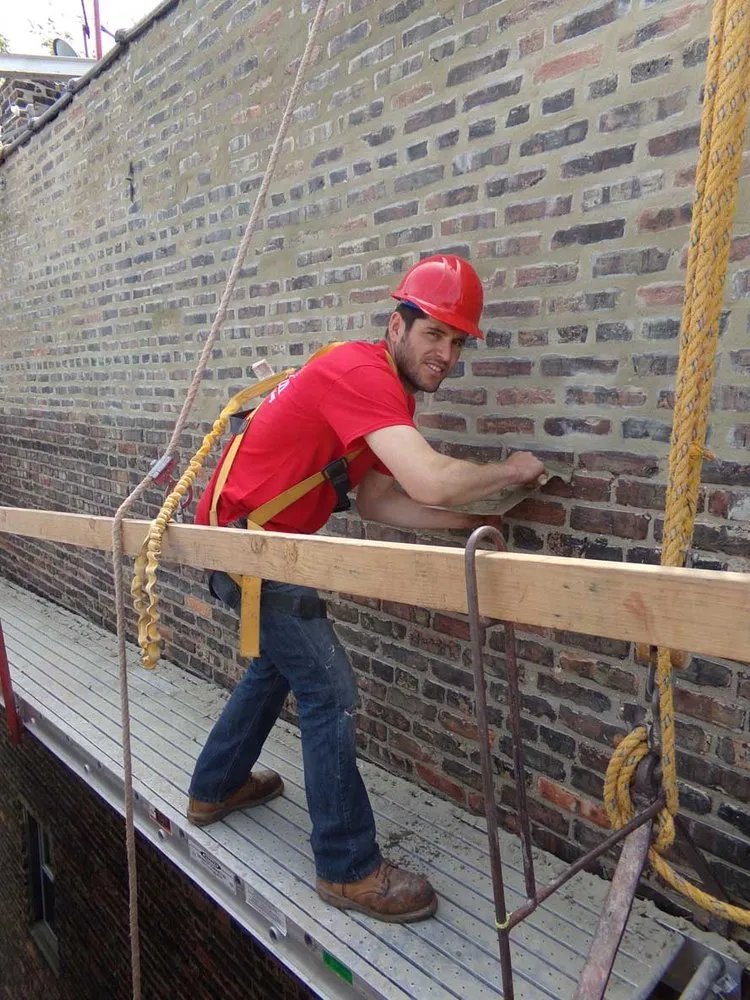 Slide of Nombach Roofing & Tuckpointing