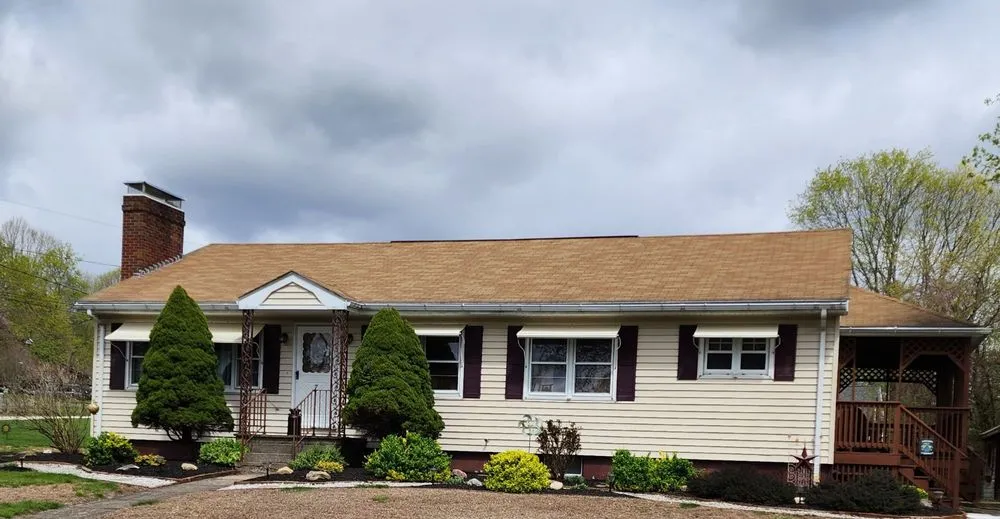 Slide of Nor'Easter Roofing