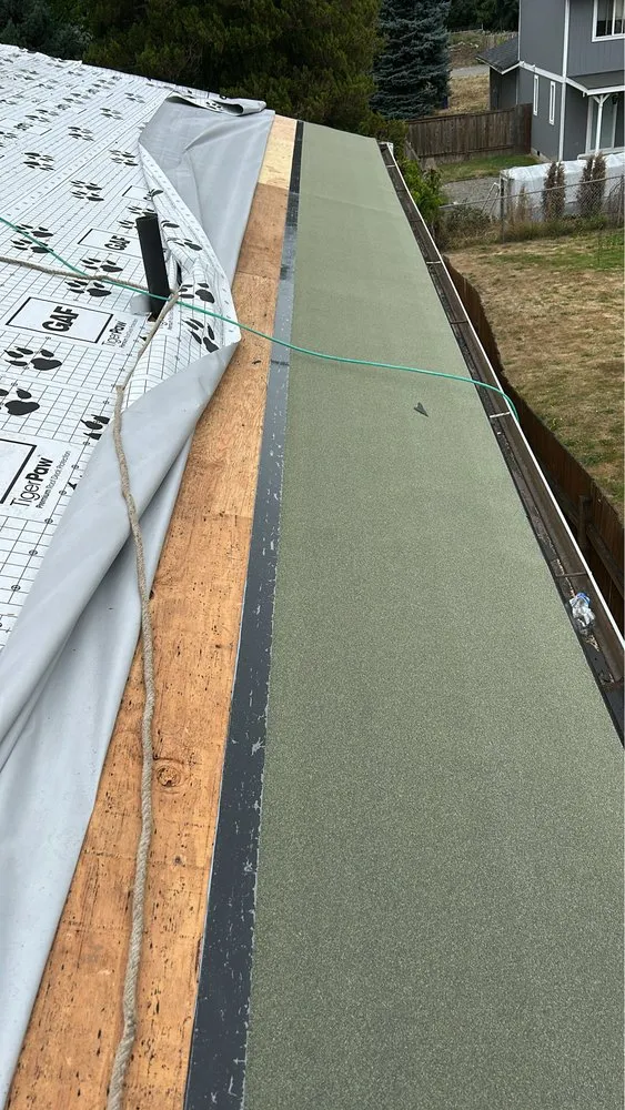 Slide of Noresta Roofing