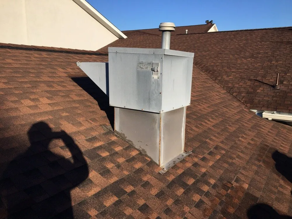 Slide of Norfolk Roofing