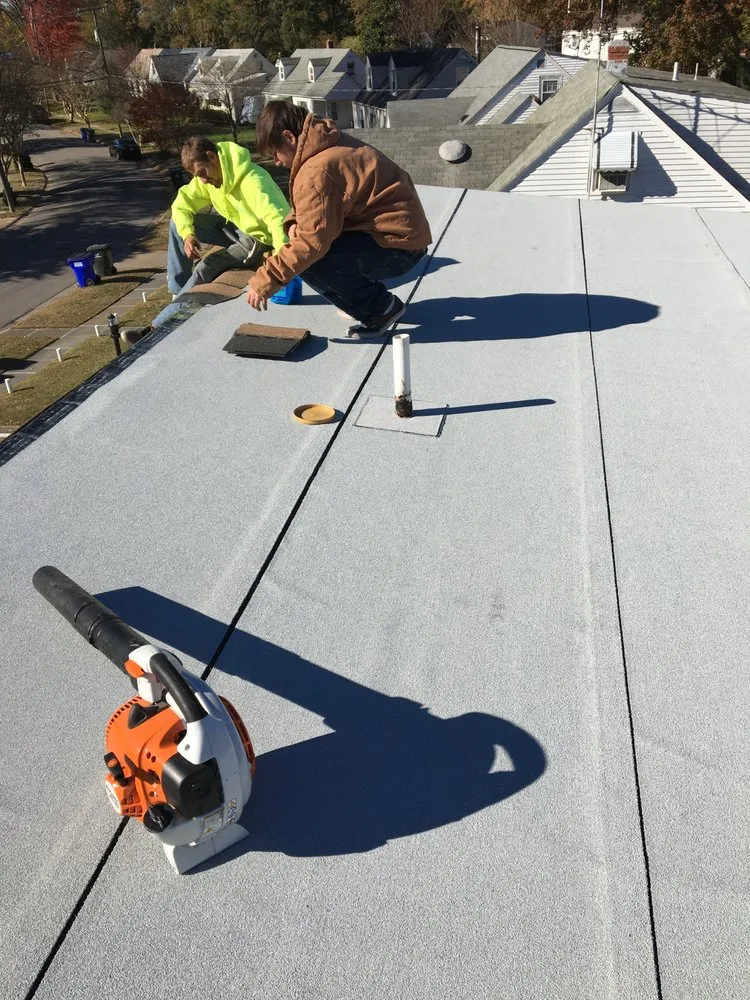 Slide of Norfolk Roofing