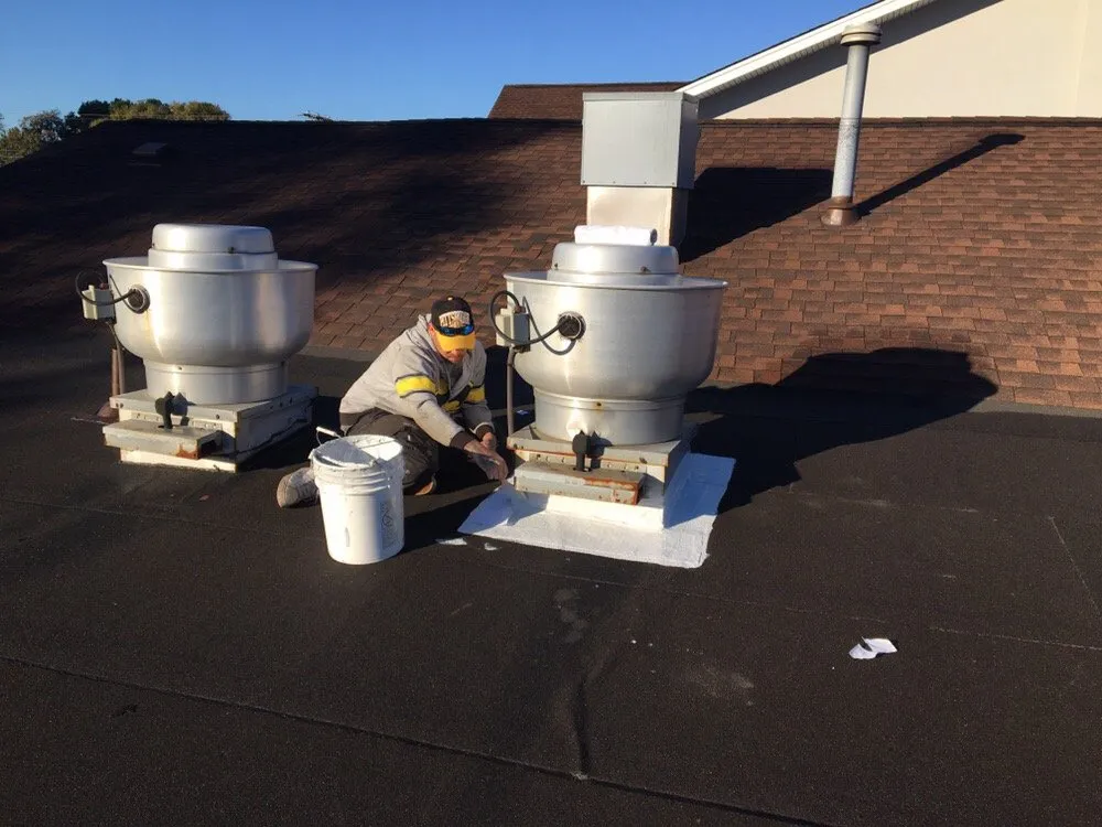 Slide of Norfolk Roofing