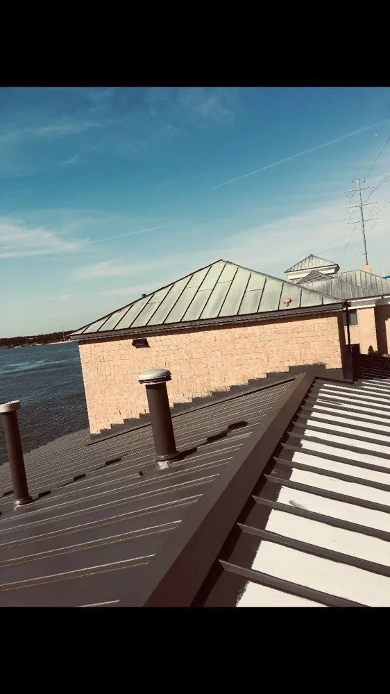 Slide of Norfolk Roofing